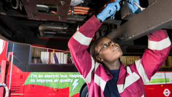Mechanic working on electric London bus