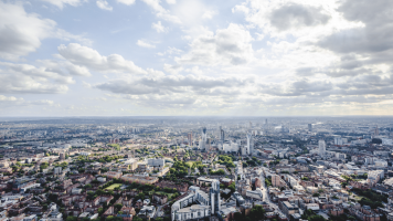 Aerial view of London on a sunny, partly-cloudy day