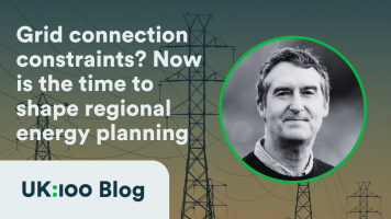 Uk100 Blog banner image, featuring picture of pylons in background and photo of Adrian ross (author) in foreground, with the question 'Grid connection constaints? Now is the time to shape regional energy planning'