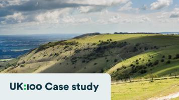 A landscape view of a sunny South Downs National Park.