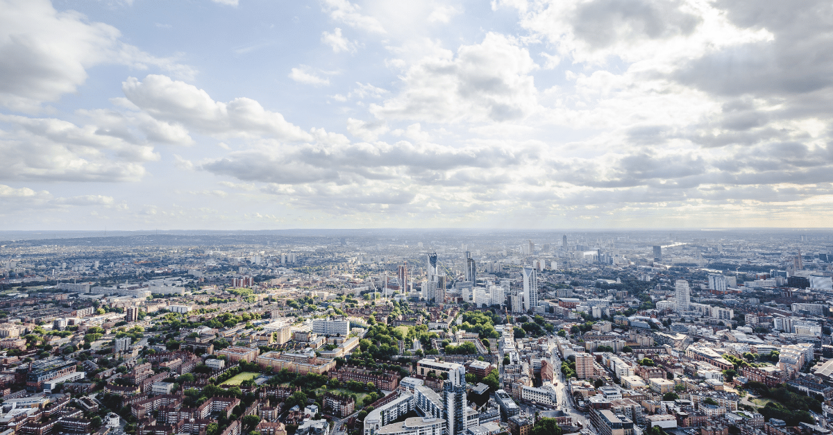 Aerial view of London on a sunny, partly-cloudy day