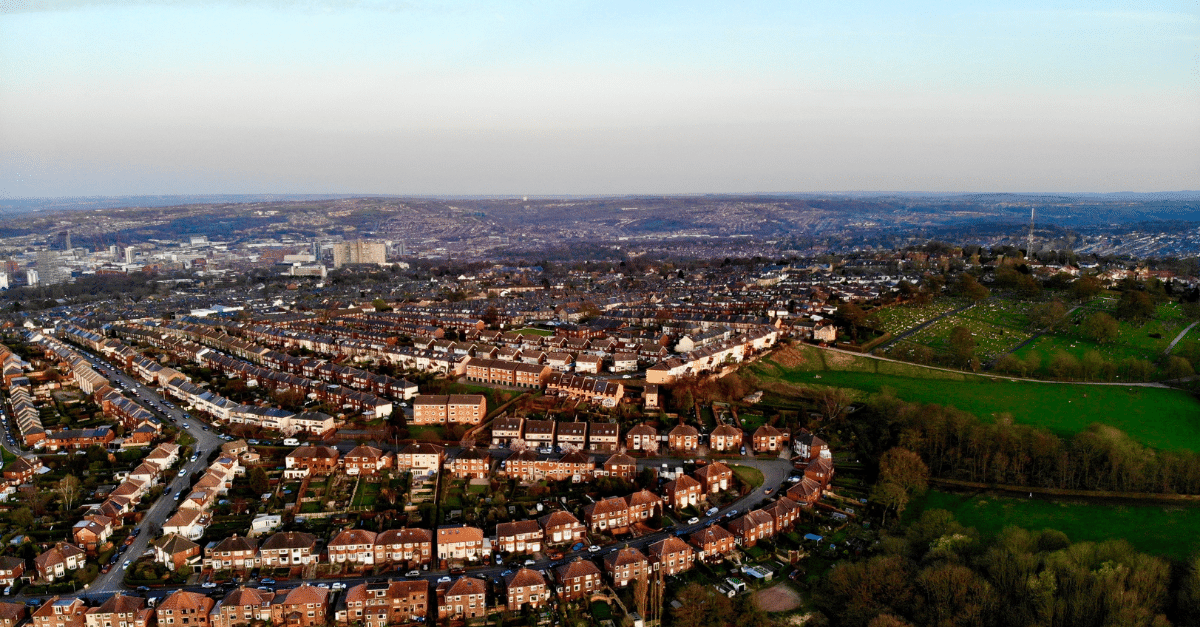 Aerial view of Sheffield homes on a clear afternoon at dusk